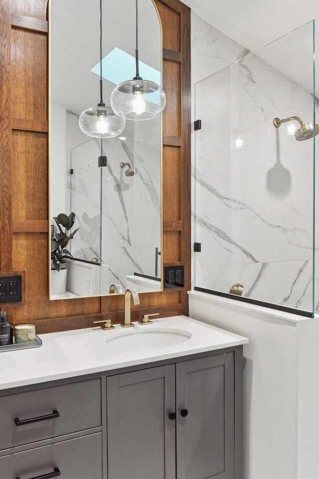 1611 Hill Ridge Ter, Minnetonka, MN 55305 - full bathroom featuring vanity and a marble finish shower