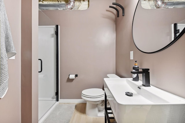 1611 Hill Ridge Ter, Minnetonka, MN 55305 - full bathroom with a stall shower, wood finished floors, and vanity