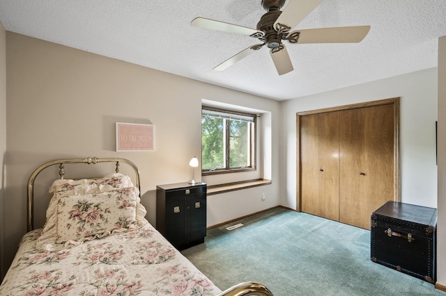 19402 Carson Cir NW, Elk River, MN 55330 - bedroom featuring carpet, a textured ceiling, ceiling fan, and a closet