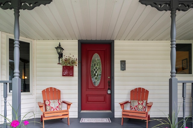 19402 Carson Cir NW, Elk River, MN 55330 - doorway to property featuring covered porch