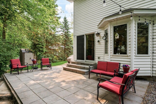 19402 Carson Cir NW, Elk River, MN 55330 - view of patio / terrace with entry steps, an outdoor hangout area, and a storage unit