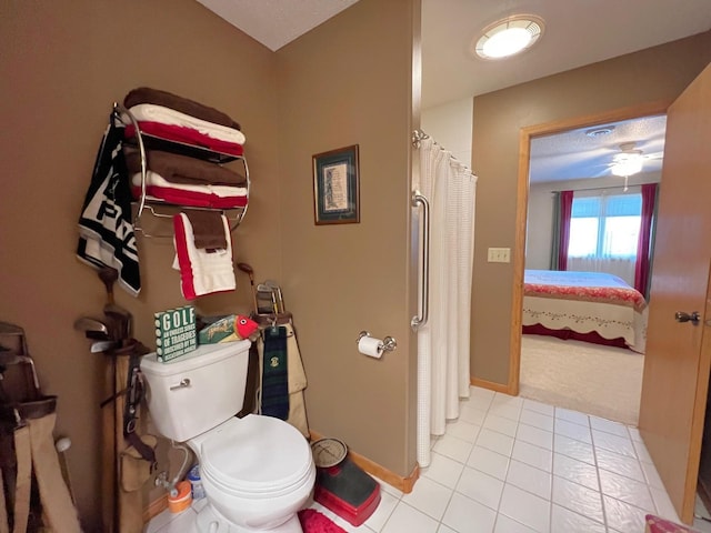 102 Mayfair Ave, New London, MN 56273 - ensuite bathroom featuring tile patterned flooring and a shower with curtain