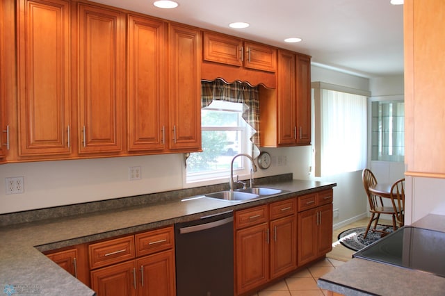 509 24th Ave N, Fargo, ND 58102 - kitchen with dishwasher, brown cabinets, dark countertops, and recessed lighting