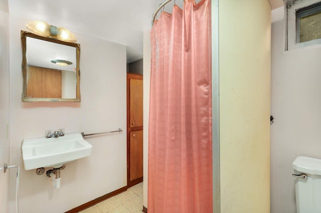 3609 Elliot Ave, Minneapolis, MN 55407 - bathroom with a sink and tile patterned floors