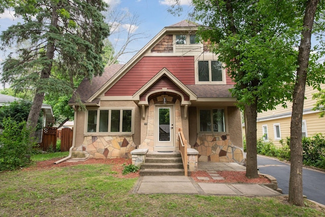 3305 Huntington Ave, Saint Louis Park, MN 55416 - view of front facade featuring roof with shingles and stone siding