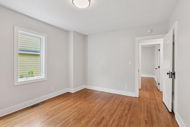 3305 Huntington Ave, Saint Louis Park, MN 55416 - unfurnished room with wood finished floors and a smoke detector