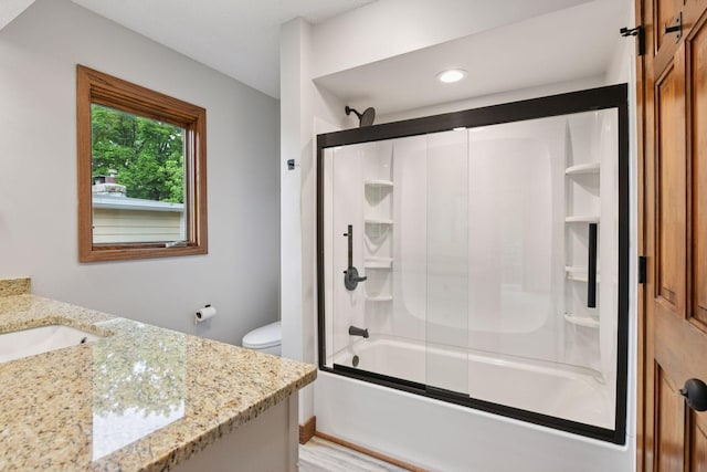 3305 Huntington Ave, Saint Louis Park, MN 55416 - bathroom with vanity, bath / shower combo with glass door, and recessed lighting
