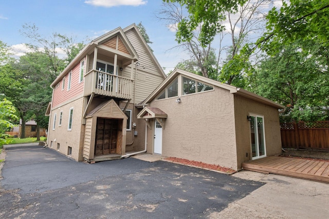 3305 Huntington Ave, Saint Louis Park, MN 55416 - view of front facade featuring stucco siding and a wooden deck