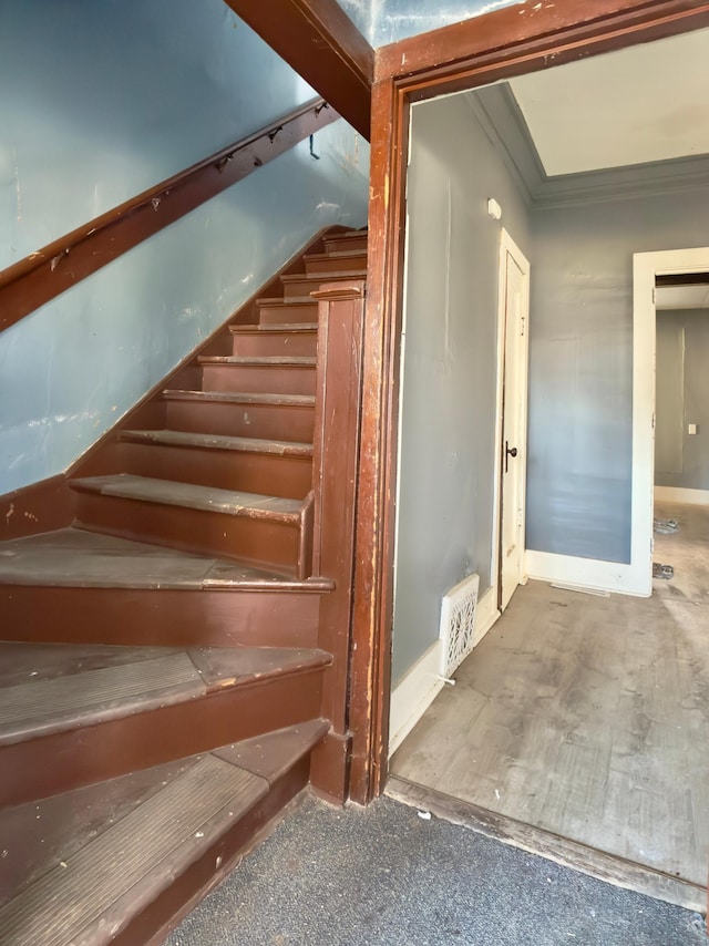 415 College St, Albert Lea, MN 56007 - staircase with baseboards and crown molding