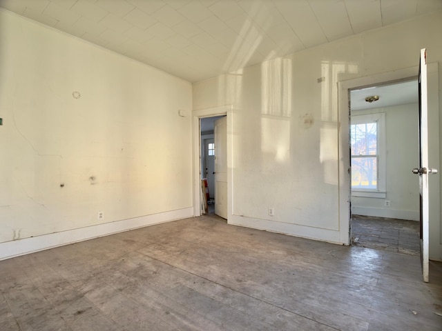 415 College St, Albert Lea, MN 56007 - empty room with baseboards