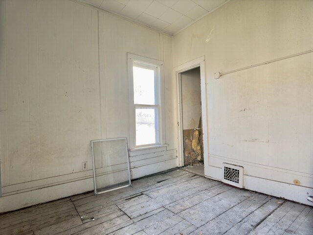 415 College St, Albert Lea, MN 56007 - unfurnished room with wood finished floors