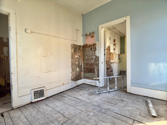 415 College St, Albert Lea, MN 56007 - unfurnished room with wood finished floors