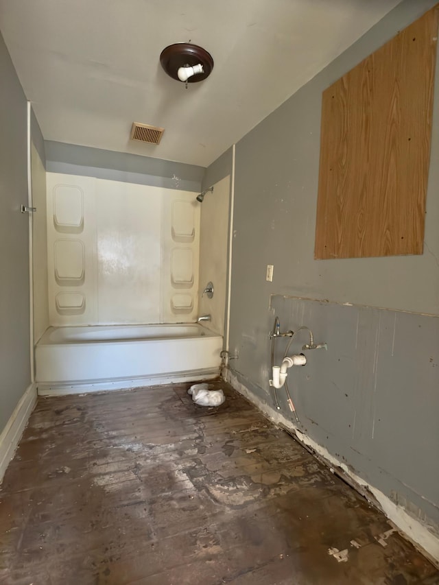 415 College St, Albert Lea, MN 56007 - bathroom with shower / washtub combination and baseboards