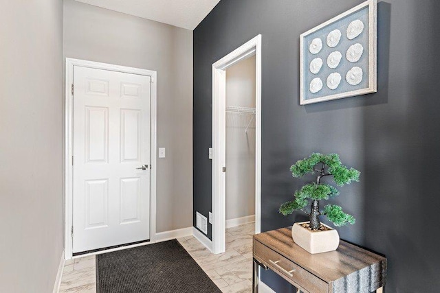 1681 Upper 143rd St E, Rosemount, MN 55068 - entryway featuring baseboards and light marble finish flooring
