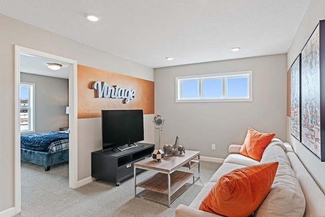 1681 Upper 143rd St E, Rosemount, MN 55068 - living room featuring light colored carpet, a textured ceiling, and recessed lighting
