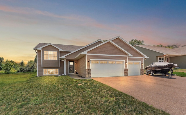 300 Dakota Ave, Roberts, WI 54023 - view of front of property featuring a garage, a front lawn, driveway, and stone siding