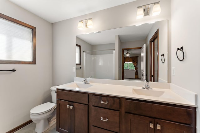 300 Dakota Ave, Roberts, WI 54023 - full bath with double vanity, a shower, and ceiling fan