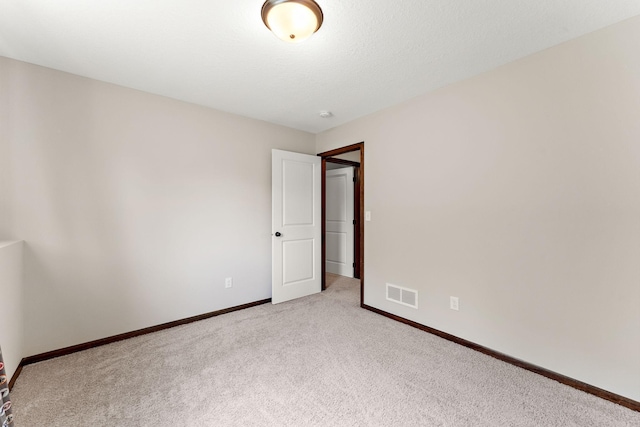 300 Dakota Ave, Roberts, WI 54023 - carpeted empty room featuring baseboards
