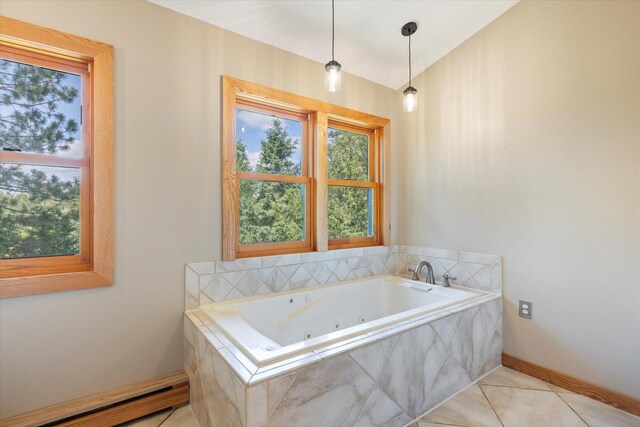 14766 Danson Rd, Splithand Twp, MN 55744 - bathroom featuring a baseboard radiator, a jetted tub, and tile patterned floors