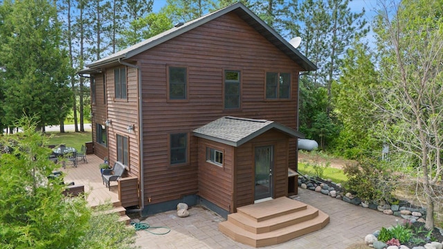 14766 Danson Rd, Splithand Twp, MN 55744 - rear view of property featuring a wooden deck