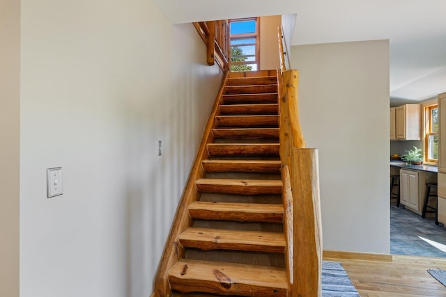 14766 Danson Rd, Splithand Twp, MN 55744 - staircase with wood finished floors and baseboards