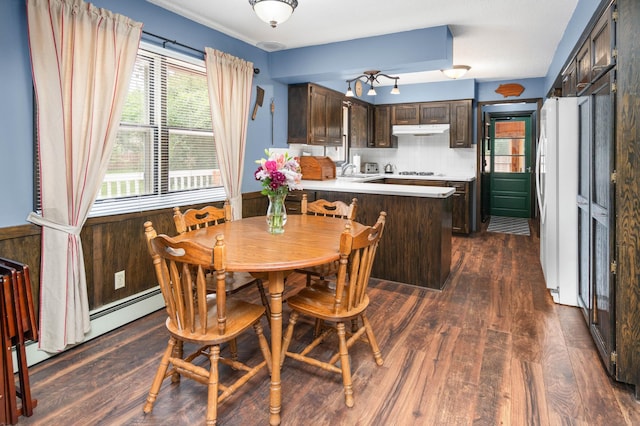 1708 Woodland Rd, Saint Cloud, MN 56304 - dining space with dark wood-type flooring and a baseboard radiator