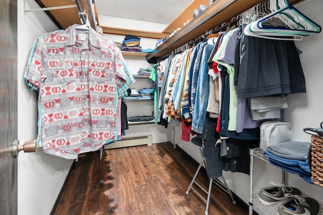 1708 Woodland Rd, Saint Cloud, MN 56304 - spacious closet with baseboard heating and wood finished floors