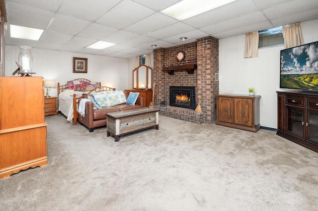 1708 Woodland Rd, Saint Cloud, MN 56304 - bedroom featuring a paneled ceiling, carpet, and a brick fireplace