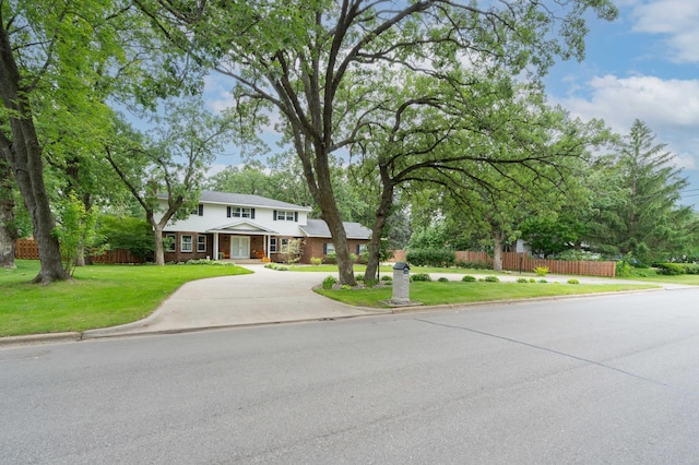 1708 Woodland Rd, Saint Cloud, MN 56304 - traditional home with brick siding and driveway