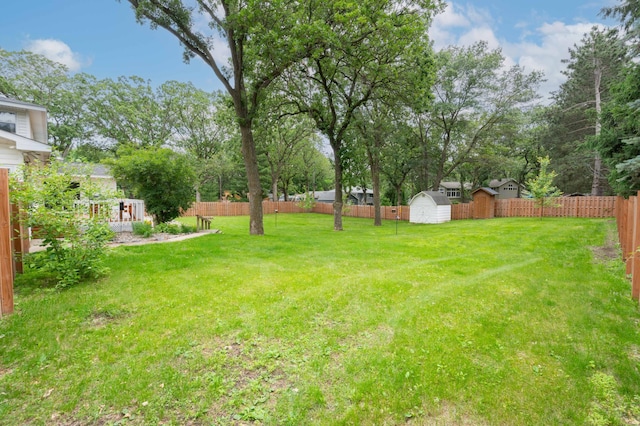 1708 Woodland Rd, Saint Cloud, MN 56304 - fenced backyard featuring a storage unit