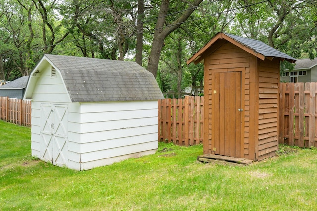1708 Woodland Rd, Saint Cloud, MN 56304 - view of shed with a fenced backyard