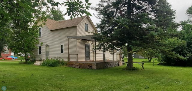 103 Main St S, Kindred, ND 58052 - view of property exterior with a yard and a deck