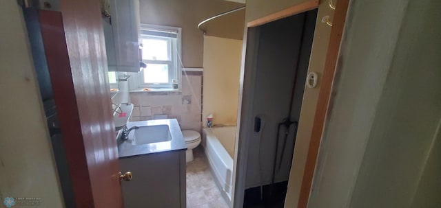 103 Main St S, Kindred, ND 58052 - full bathroom featuring vanity, tile walls, and bathing tub / shower combination