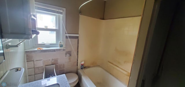 103 Main St S, Kindred, ND 58052 - bathroom featuring shower / bathtub combination and tile walls