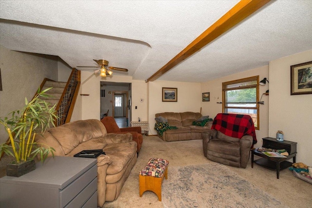 3732 6th St, Superior, WI 54880 - carpeted living room with ceiling fan, a textured ceiling, and beam ceiling