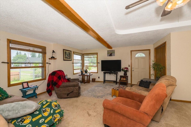 3732 6th St, Superior, WI 54880 - carpeted living area with a textured ceiling, ceiling fan, and beam ceiling