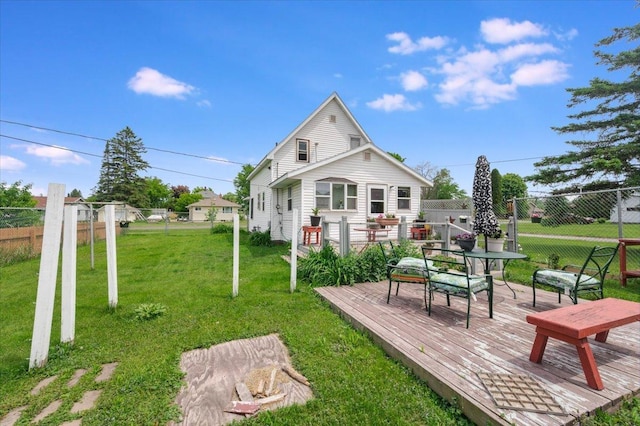 3732 6th St, Superior, WI 54880 - back of property with a fenced backyard and a wooden deck
