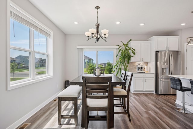 14660 109th Ave N, Maple Grove, MN 55369 - dining room with a chandelier, dark wood-style floors, and recessed lighting