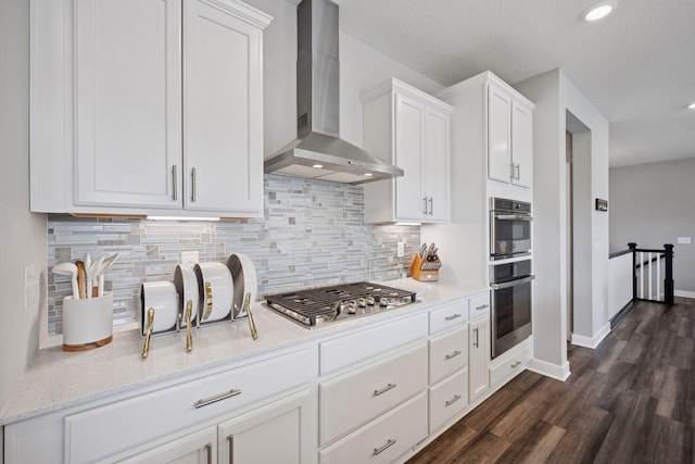 14660 109th Ave N, Maple Grove, MN 55369 - kitchen with wall chimney exhaust hood, appliances with stainless steel finishes, white cabinets, tasteful backsplash, and recessed lighting