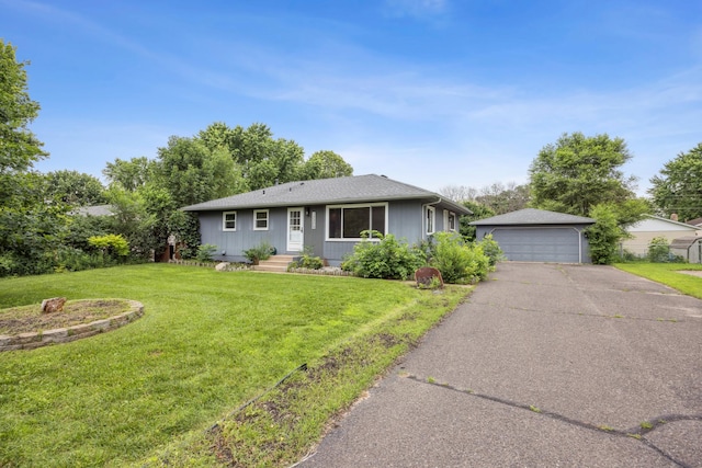 12209 Davenport St NE, Blaine, MN 55449 - ranch-style house featuring a detached garage, an outbuilding, and a front lawn