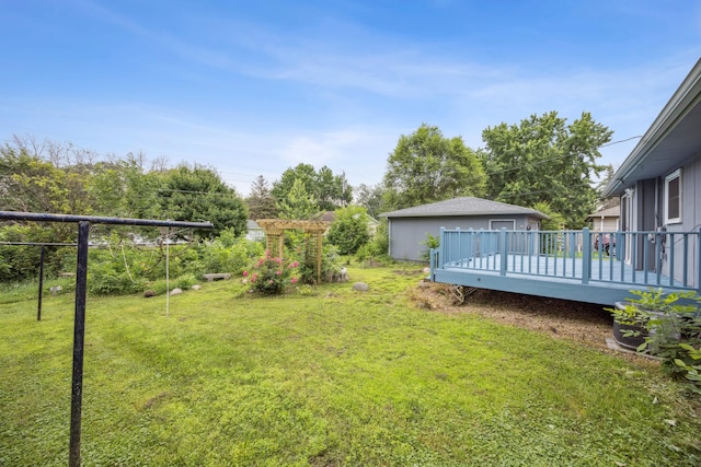 12209 Davenport St NE, Blaine, MN 55449 - view of green lawn featuring a deck
