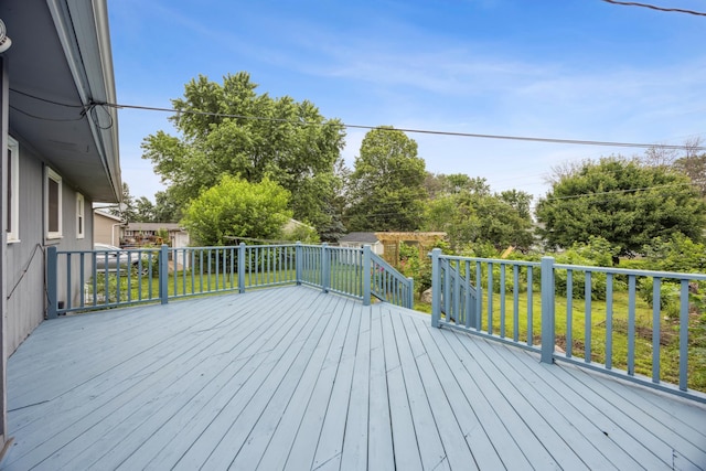 12209 Davenport St NE, Blaine, MN 55449 - wooden deck with a yard and view of wooded area