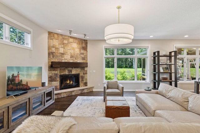 2 Red Forest Ln, North Oaks, MN 55127 - living room featuring plenty of natural light, wood finished floors, a fireplace, and recessed lighting