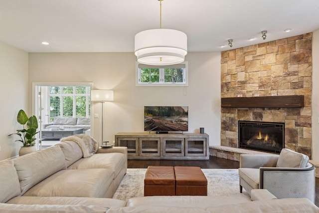 2 Red Forest Ln, North Oaks, MN 55127 - living room with wood finished floors, plenty of natural light, a fireplace, and recessed lighting