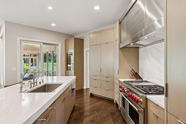 2 Red Forest Ln, North Oaks, MN 55127 - kitchen with double oven range, recessed lighting, dark wood-type flooring, wall chimney range hood, and backsplash