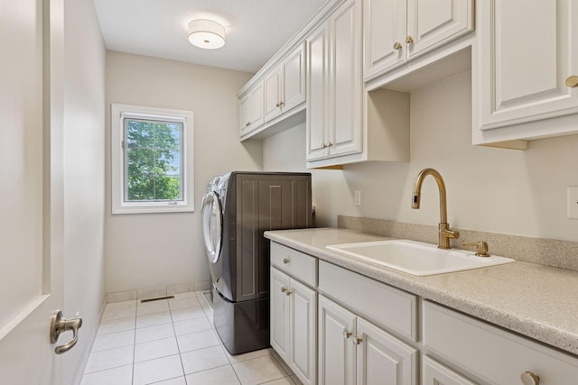 2 Red Forest Ln, North Oaks, MN 55127 - laundry area featuring cabinet space, light tile patterned flooring, and washer / clothes dryer