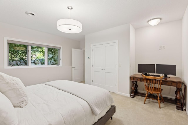 2 Red Forest Ln, North Oaks, MN 55127 - bedroom featuring light carpet, a closet, and a desk