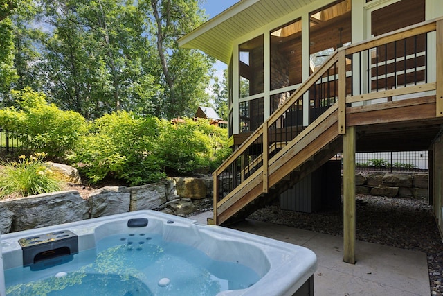 2 Red Forest Ln, North Oaks, MN 55127 - view of swimming pool with stairs, a sunroom, a hot tub, and a deck