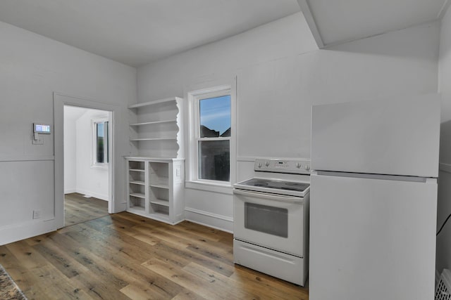 12 16th Ave N, Saint Cloud, MN 56303 - kitchen with white appliances and wood finished floors