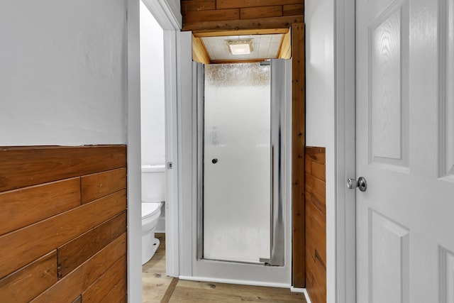 12 16th Ave N, Saint Cloud, MN 56303 - bathroom featuring a shower stall and wood finished floors